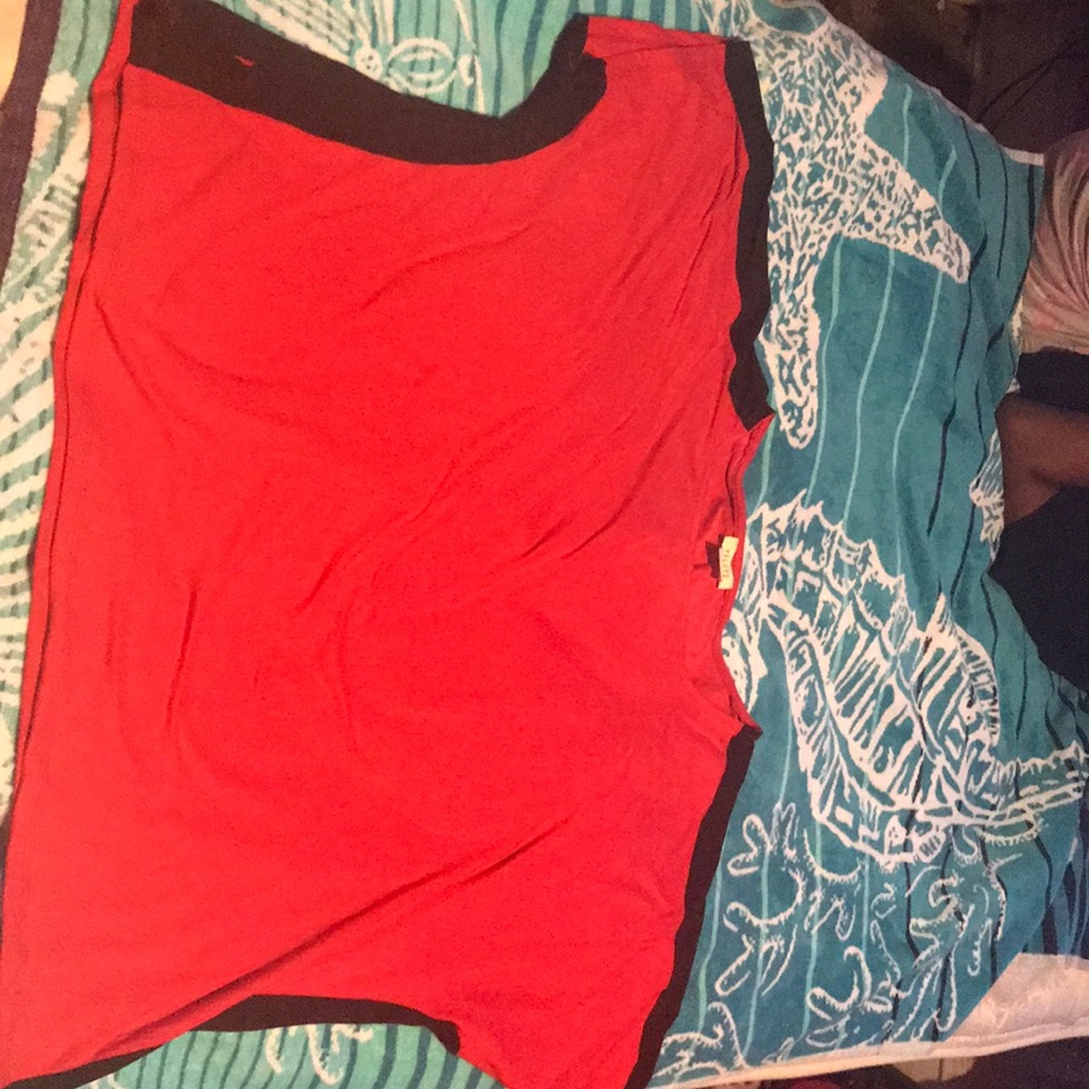 Red top with a black strip on the side